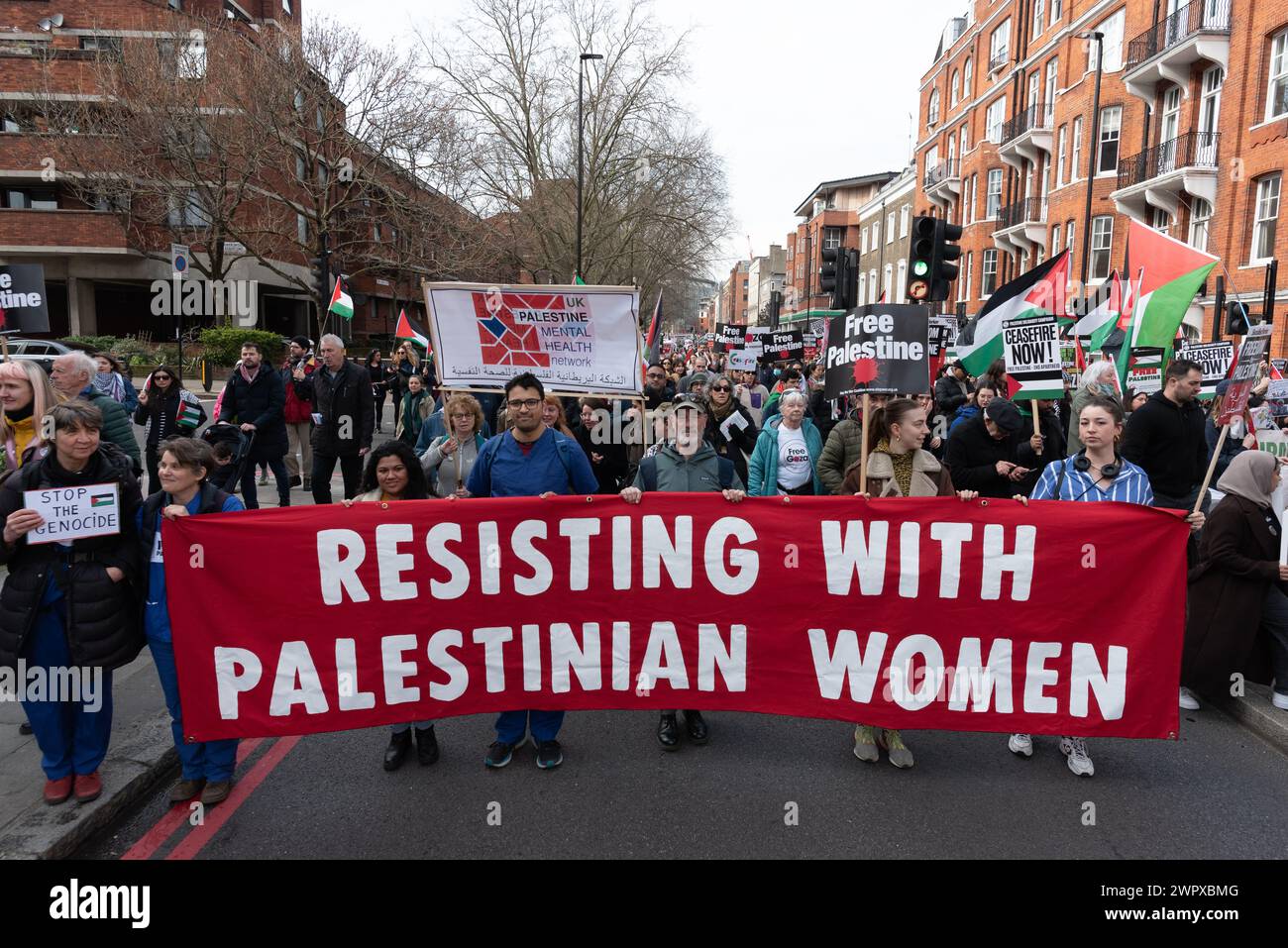 London, UK. 9 March, 2024. Tens of thousands of Palestine supporters march through London from Hyde Park to the U.S. Embassy calling for a ceasefire and an end to UK and US support for Israel's siege, bombardment and invasion of Gaza. Under blockade since 2007, Gaza has been described by United Nations Secretary-General Antonio Guterres as becoming 'a graveyard for children'. Credit: Ron Fassbender/Alamy Live News Stock Photo