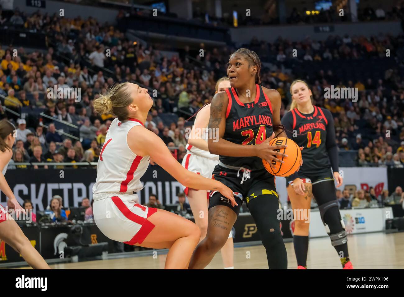 Minneapolis, Minnesota, USA. 9th Mar, 2024. Maryland Terrapins guard BRI MCDANIEL (24) looks for a shot during a semifinals game between Maryland and Nebraska at the 2024 TIAA Big10 Women's Basketball Tournament at Target Center on March 9th, 2024. Nebraska won 78-68. (Credit Image: © Steven Garcia/ZUMA Press Wire) EDITORIAL USAGE ONLY! Not for Commercial USAGE! Stock Photo