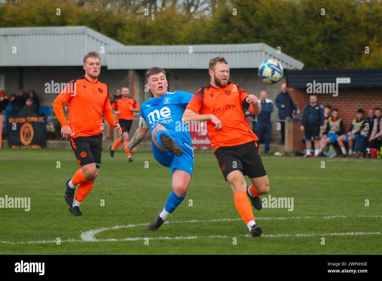 Heather, UK, 9, March, 2024:Kyle Jardine lobs the Bilston goalkeeper Joe Gilbert to score the second goal in the Midland Football League match between.Heather St Johns and Bilston Town Community  Credit: Clive Stapleton/Alamy Live News Stock Photo