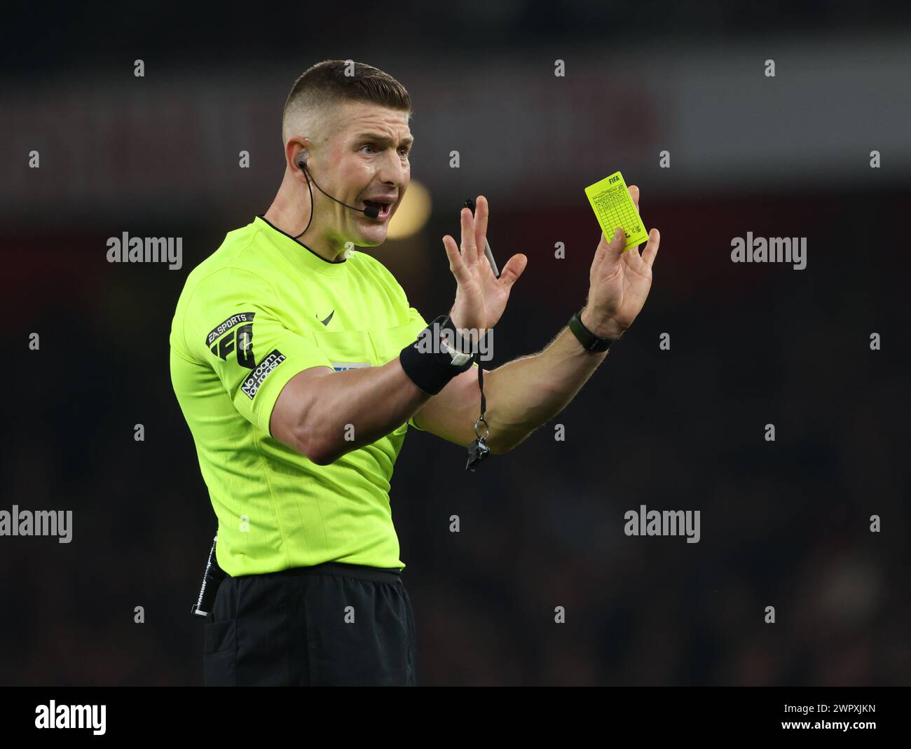 London, UK. 09th Mar, 2024. Referee Robert Jones holds a yellow card at the Arsenal v Brentford EPL match, at the Emirates Stadium, London, UK on 9th March, 2024. Credit: Paul Marriott/Alamy Live News Stock Photo
