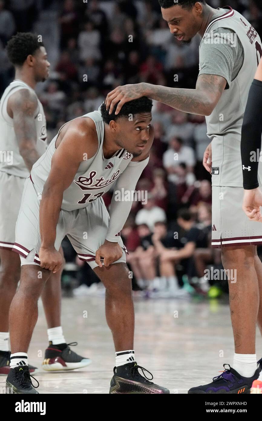 Mississippi State guard Josh Hubbard (13) is consoled by forward D.J