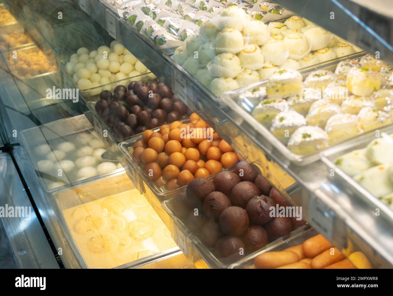 Traditional Indian sweets and desserts in pastry shop and street food