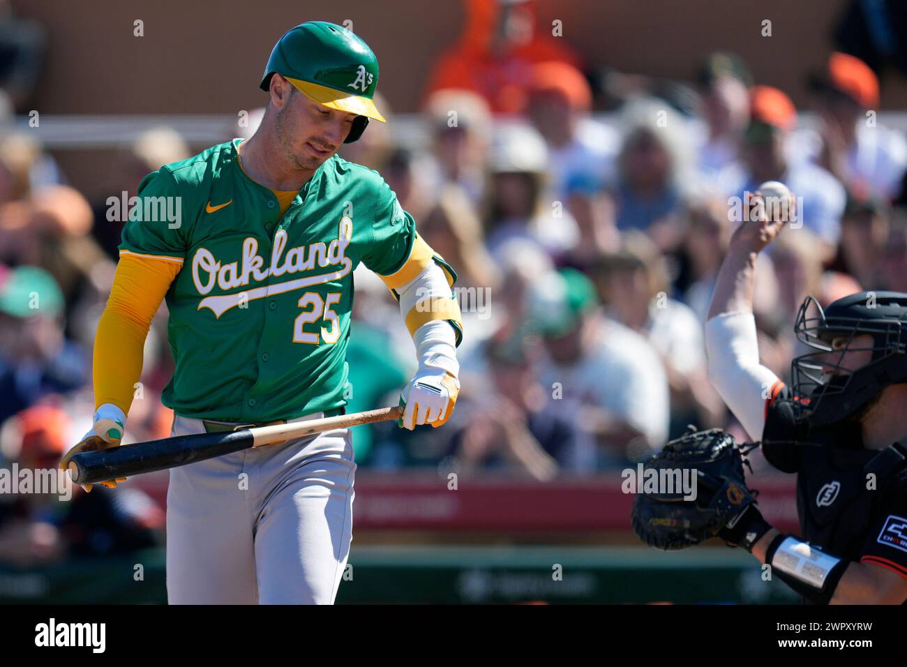 Oakland Athletics' Brent Rooker (25) walks back to the dugout after