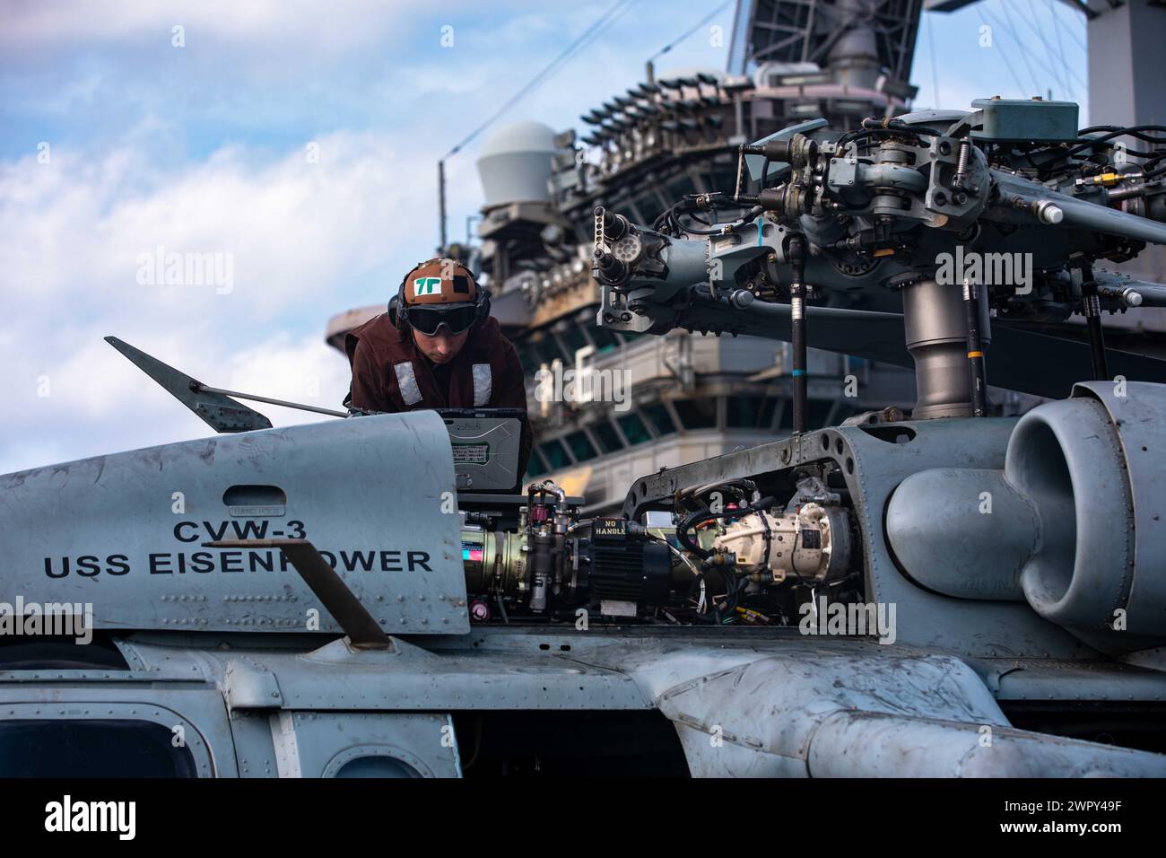 240206-N-PS818-1103 RED SEA (Feb. 6, 2024) An Aviation Machinist's Mate ...