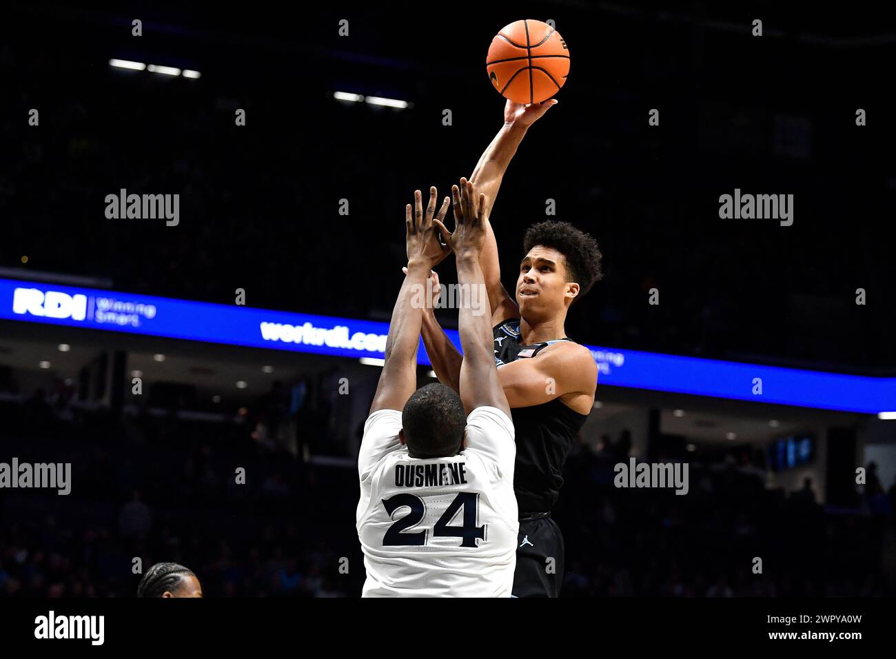 Marquette forward Oso Ighodaro (13) shoots over Xavier forward Abou ...
