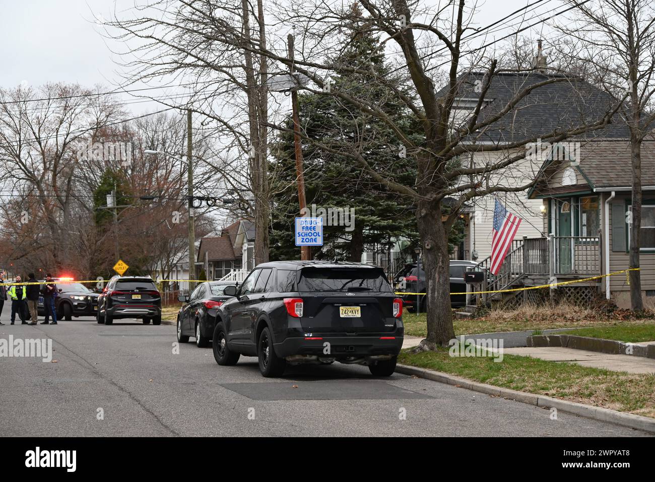 Heavy police presence at the home where a domestic disturbance and fatal police-involved shooting occurred. The Attorney General's Office is investigating a fatal police-involved shooting that occurred on March 8, 2024 in Hamilton Township. One adult male civilian sustained fatal injuries and one Hamilton Township police officer was injured and had multiple gunshot wounds and remains hospitalized. According to the preliminary information, officers from the Hamilton Township Police Department responded to a residence on Orchard Avenue after a 911 call involving a domestic incident was received Stock Photo