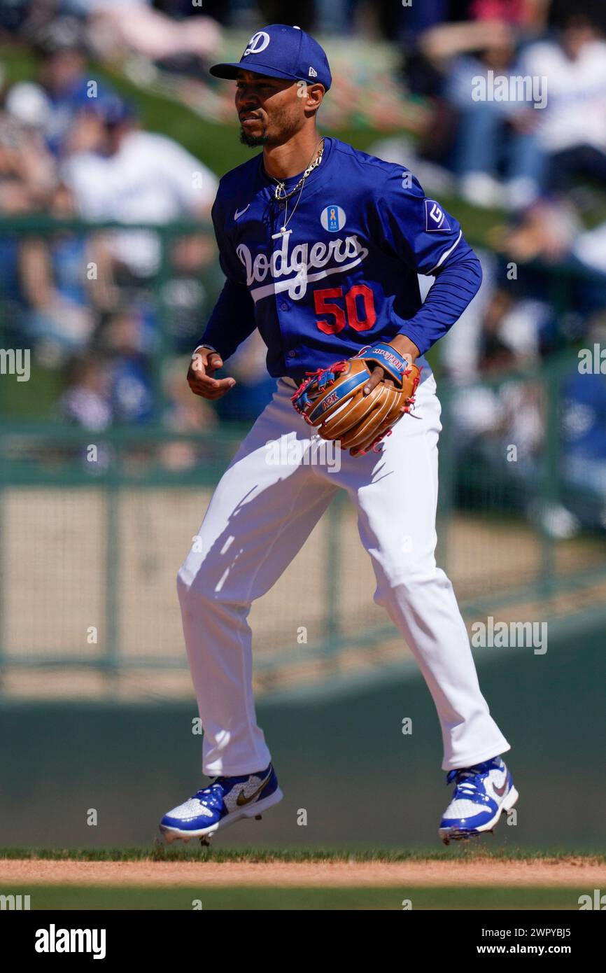 Los Angeles Dodgers shortstop Mookie Betts hops as he readies for the