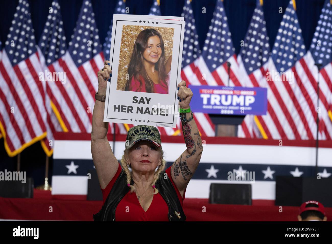 Rome, Georgia, USA. 9th Mar, 2024. Thousands of Georgia residents converge on Rome, Georgia in the largely conservative northwest corner of the state for a rally to support former President Donald Trump in his reelection bid.Pictured: A Trump supporter holds a photo of murdered Georgia nursing student Laken Riley. (Credit Image: © Robin Rayne/ZUMA Press Wire) EDITORIAL USAGE ONLY! Not for Commercial USAGE! Stock Photo
