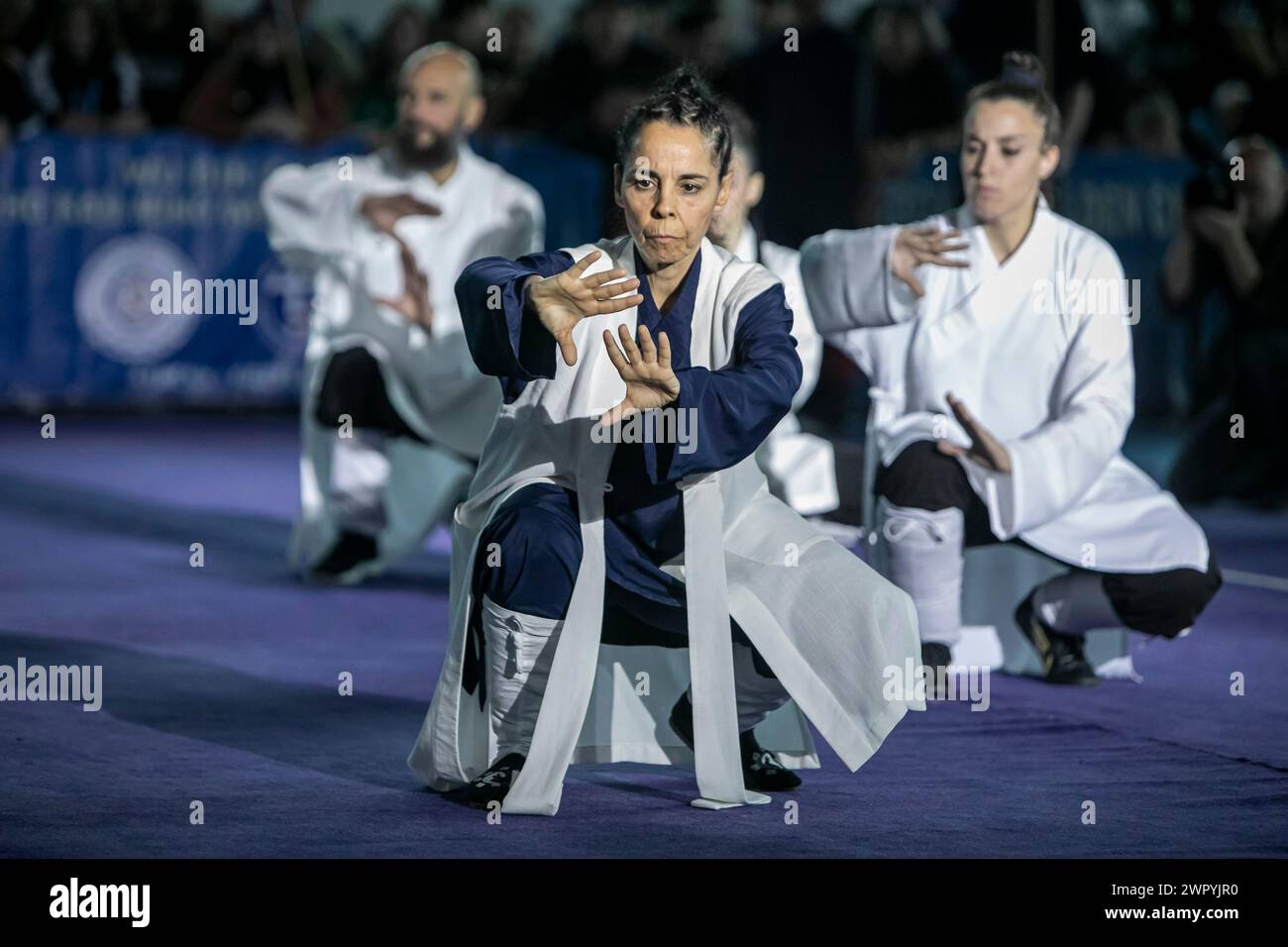 Greece, Greece. 9th Mar, 2024. Athletes perform during the opening ceremony of the Acropolis-Forbidden City International Wushu Tournament in Athens, Greece, on March 9, 2024. Credit: Panagiotis Moschandreou/Xinhua/Alamy Live News Stock Photo