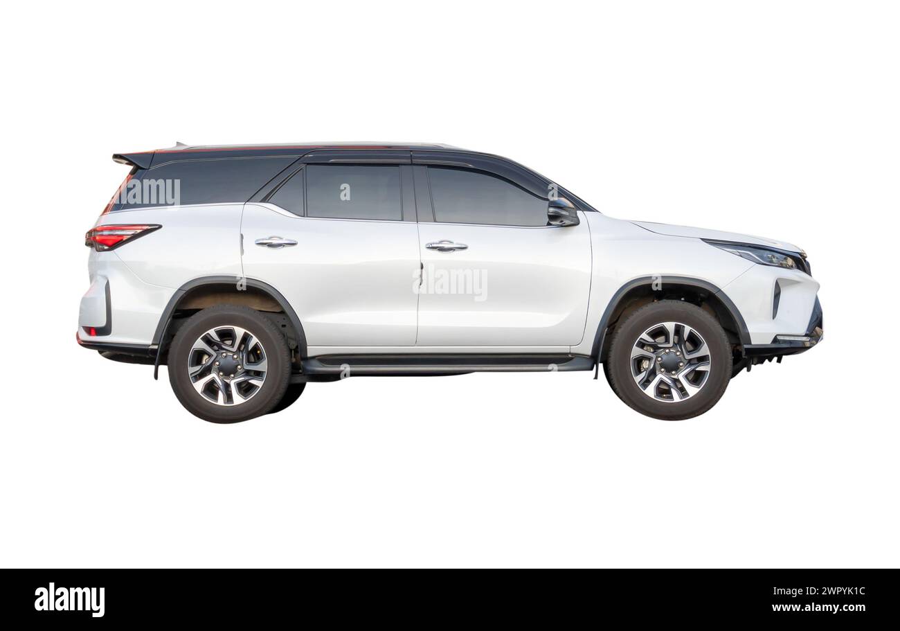 Side view of white SUV car is isolated on white background with clipping path. Stock Photo