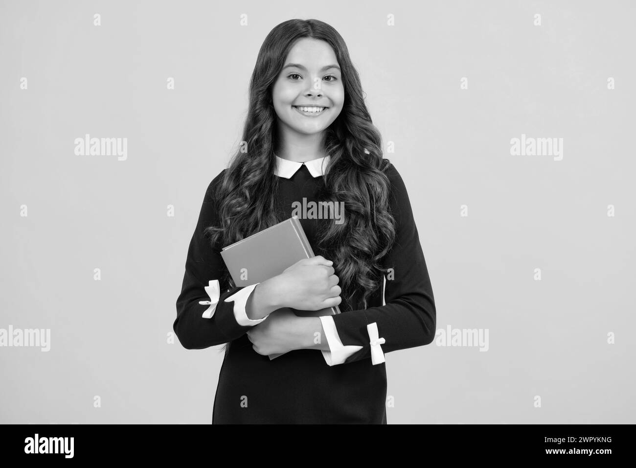 Teenager school girl with books isolated studio background Stock Photo ...