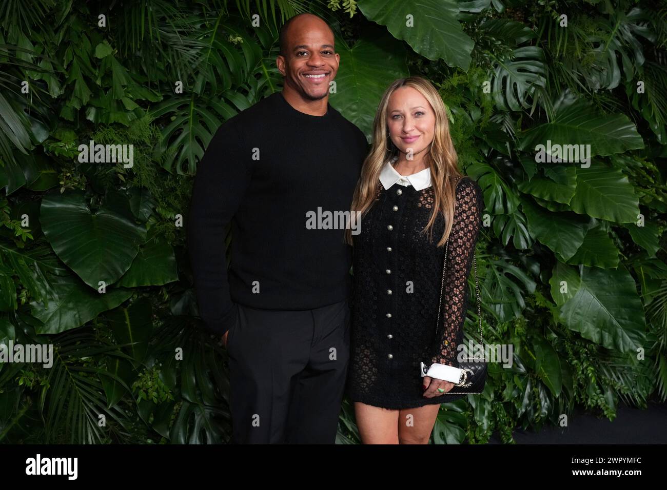 From left, Geoffrey Ogunlesi and Jennifer Meyer arrive at Chanel's 15th
