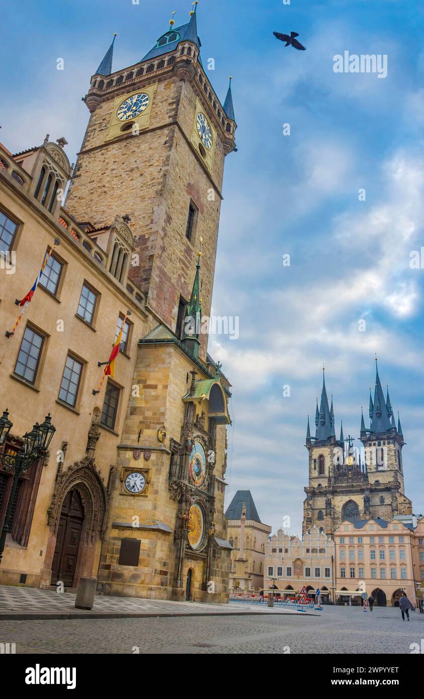 Beautiful Old Town Square with Church of our Lady Tyn and medieval astronomical clock on the Old Town Hall Tower, in Prague, Czech Republic, at sunris Stock Photo