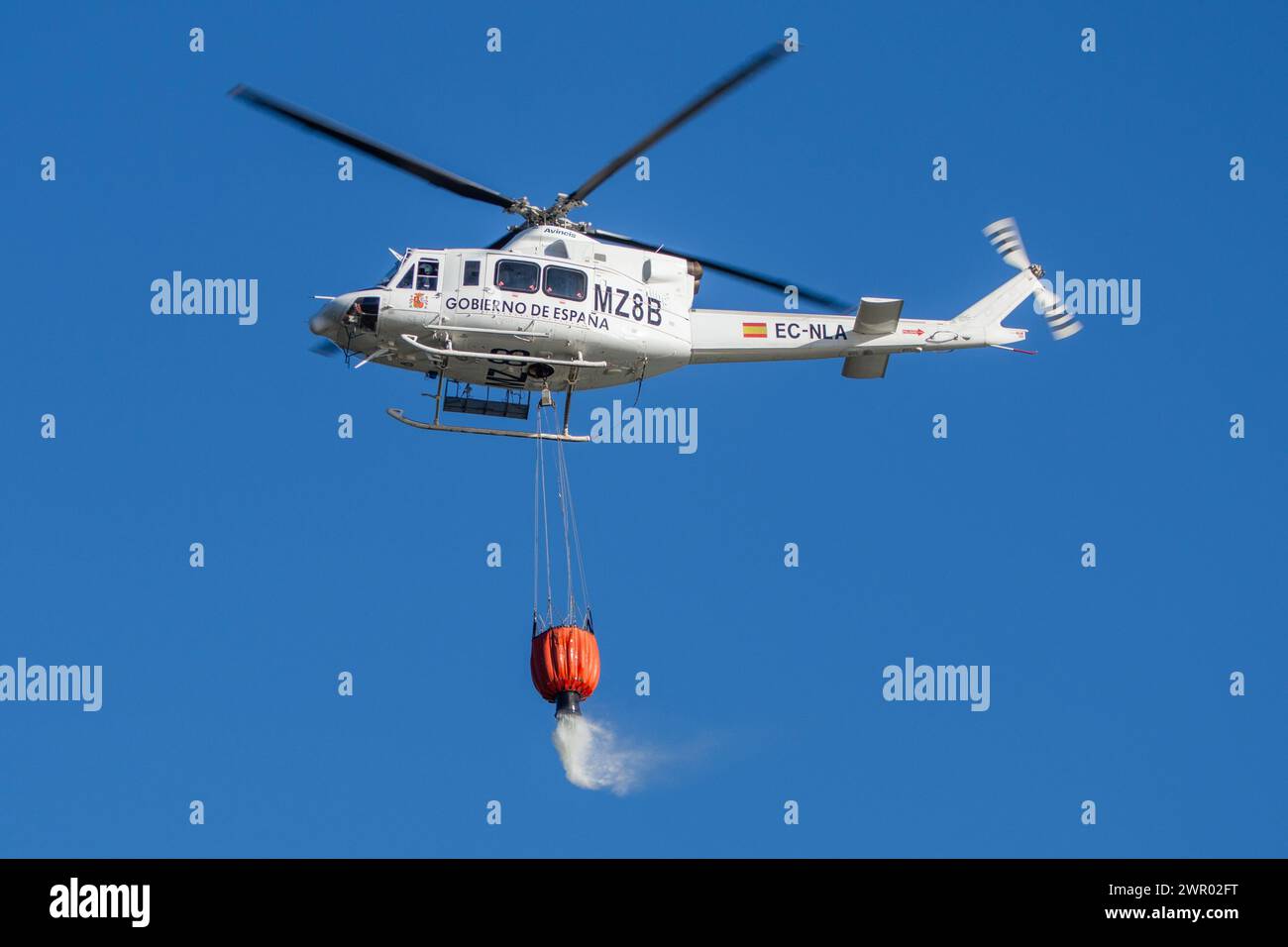 Bell 412 firefighting helicopter in the Serranía de Cuenca Stock Photo