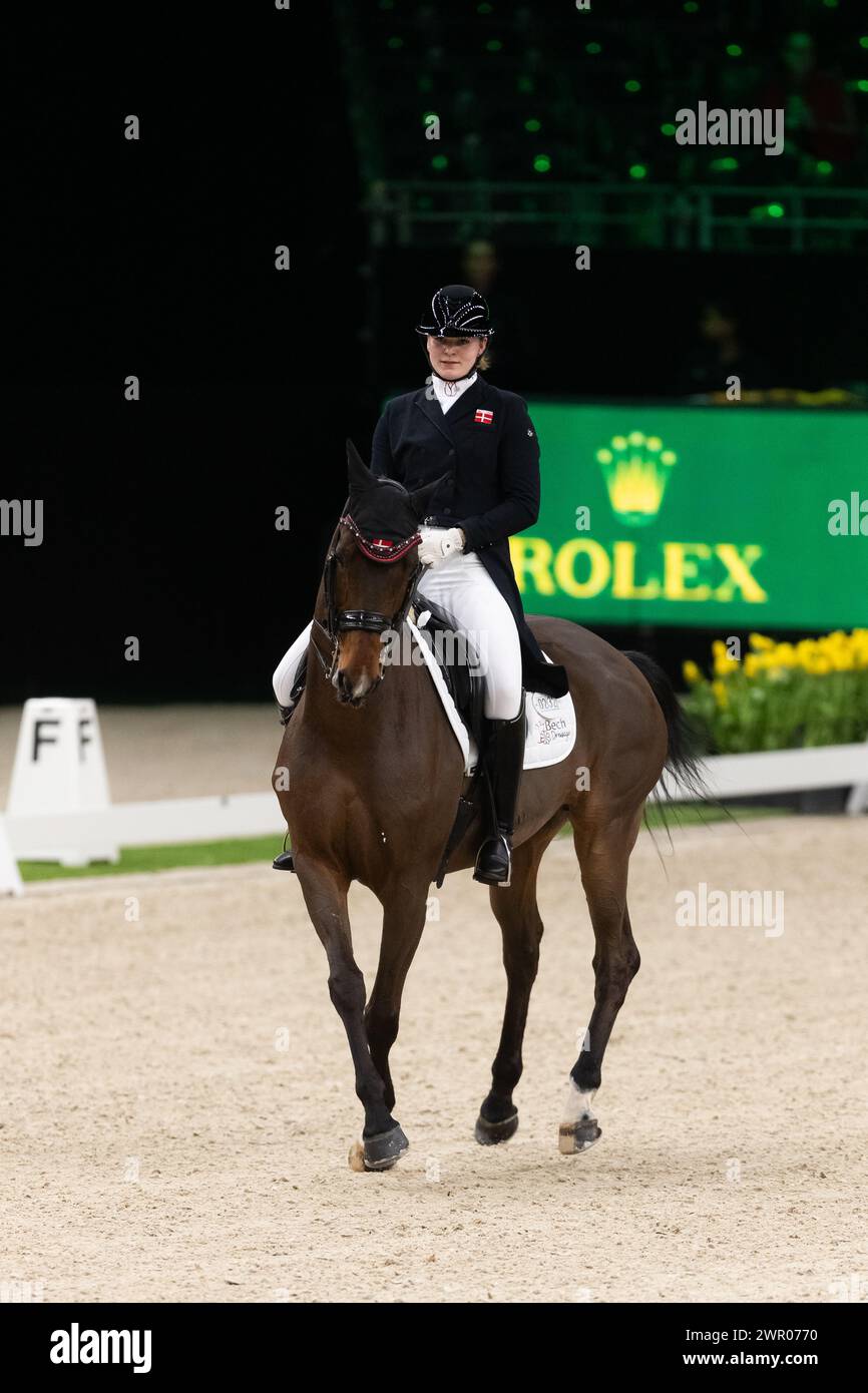 DenBosch, Netherlands - March 9, 2024. Thea Bech of Denmark and riding ...