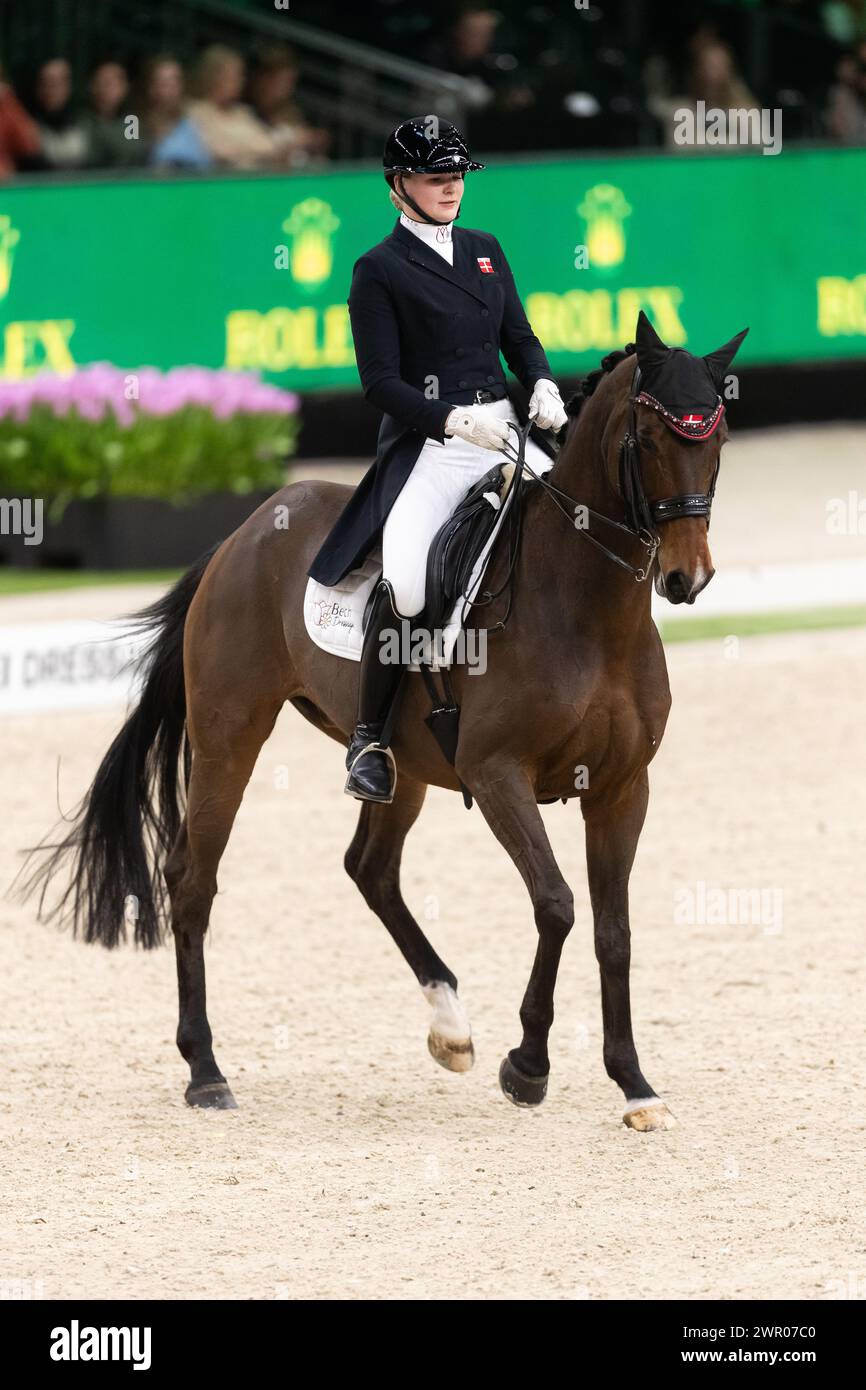 DenBosch, Netherlands - March 9, 2024. Thea Bech of Denmark and riding ...