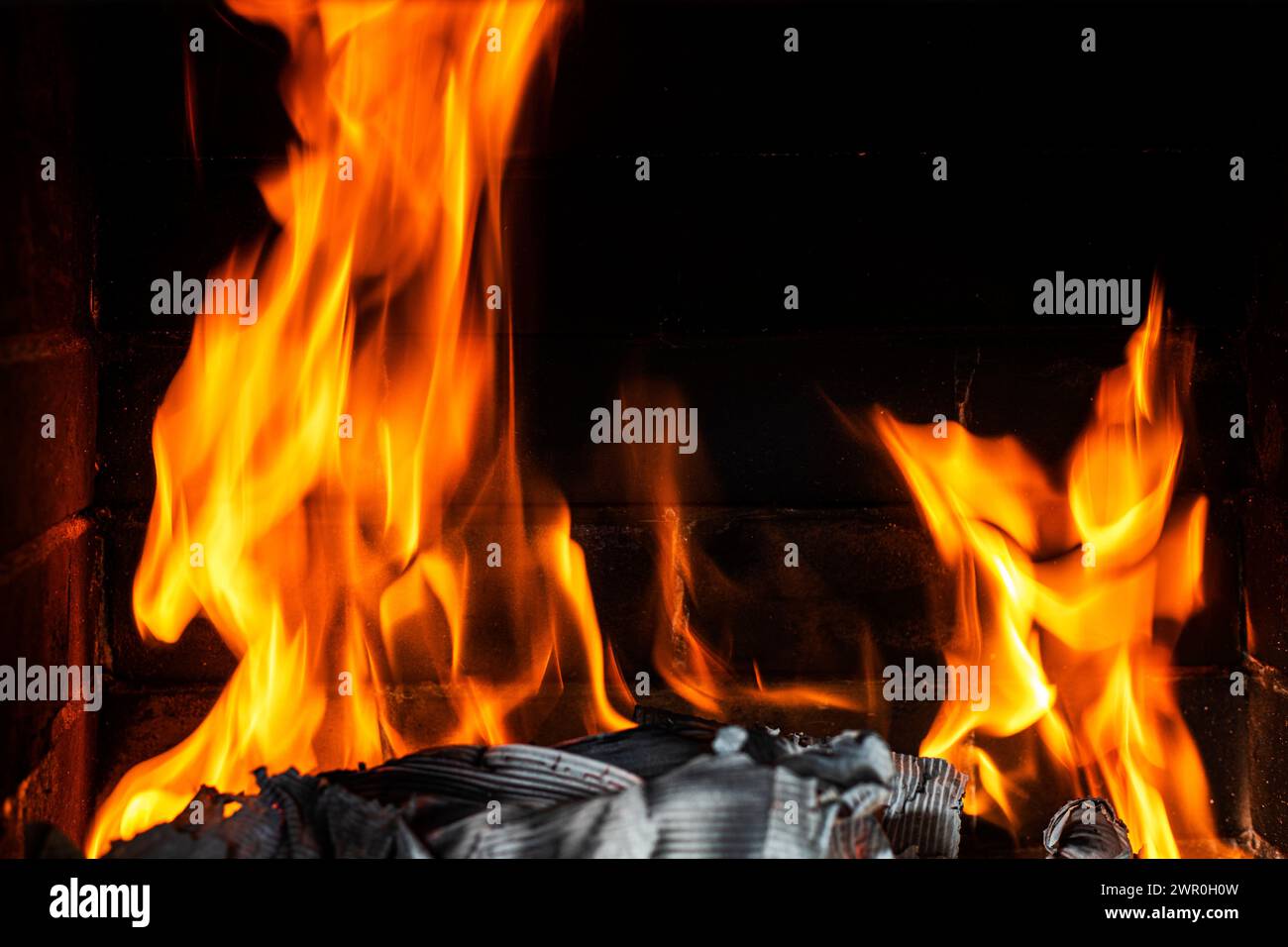 fire in the room on a dark background. Disasters, fires, natural disasters. Ecological catastrophy Stock Photo