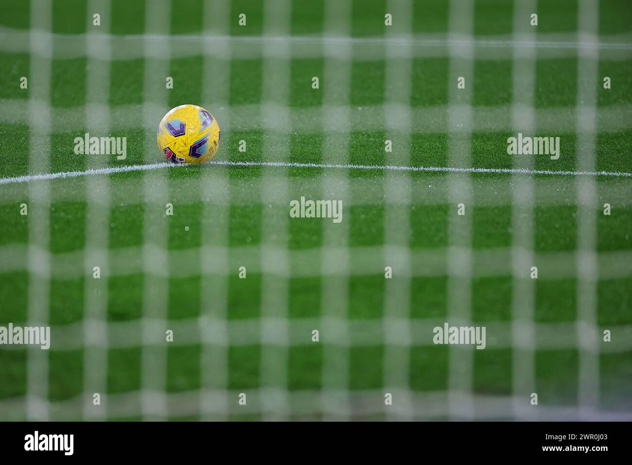 An official Puma Serie A ball is seen through the net before the Serie A football match between SSC Napoli and Torino FC at the Diego Armando Maradona stadium in Naples, Italy, on 8 March 2024. Stock Photo