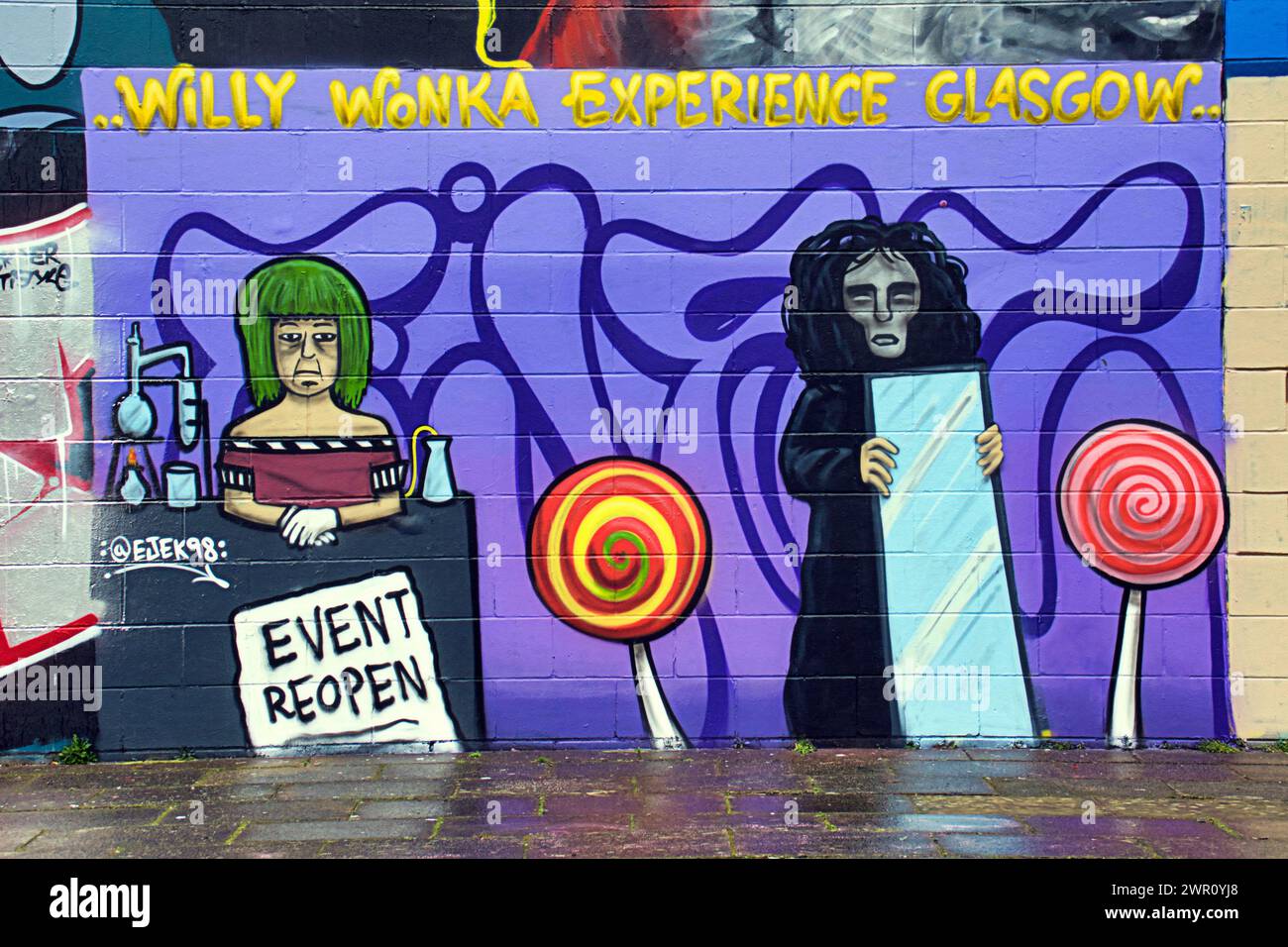 Glasgow, Scotland, UK. 10th March, 2024: Willy’s Chocolate Experience  Fans descended to the artwork on the banks  of the river clyde. Willy Wonka debacle mural appeared on the clyde side graffiti wall on the clyde walkway. The painting was created by artist Ejek after the  film experience event became national news. The artwork depicts the actresses who worked at the event as an Oompa Loompa and 'The Unknown'from the artificial intelligence script.  Credit Gerard Ferry/Alamy Live News Stock Photo