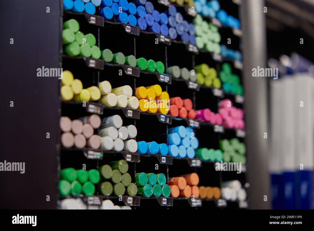 Colorful chalk crayons kit on rack display for sale in stationery shop ...