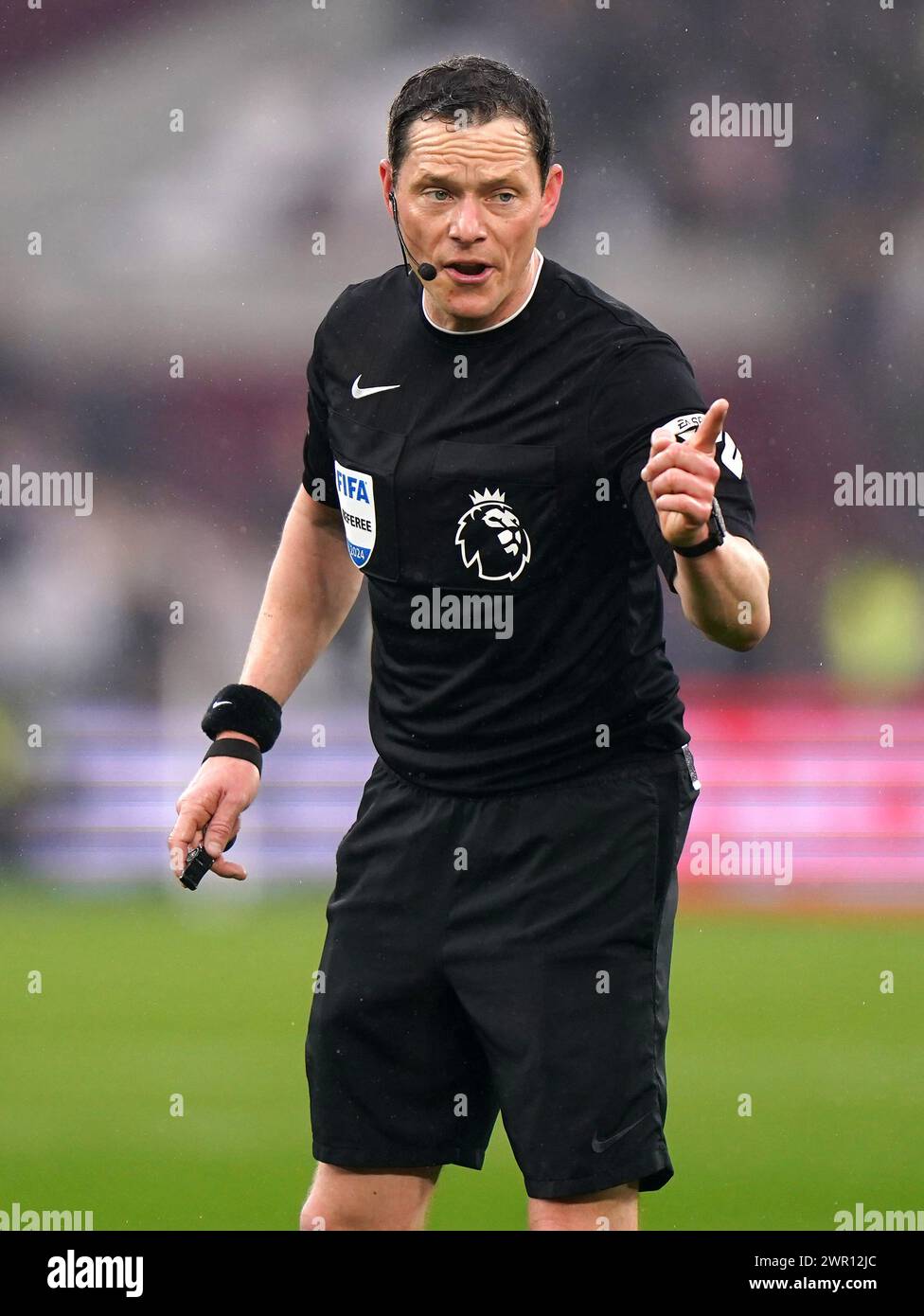 Referee Darren England during the Premier League match at the London Stadium, London. Picture date: Sunday March 10, 2024. Stock Photo