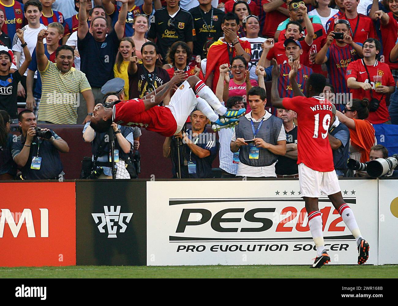 JULY 30 2011: Nani (17) of Manchester United in midair after scoring the first goal during a World Football Challenge match against FC Barcelona at Fedex Field, in Landover, Maryland.Manchester United won 2-1. Stock Photo