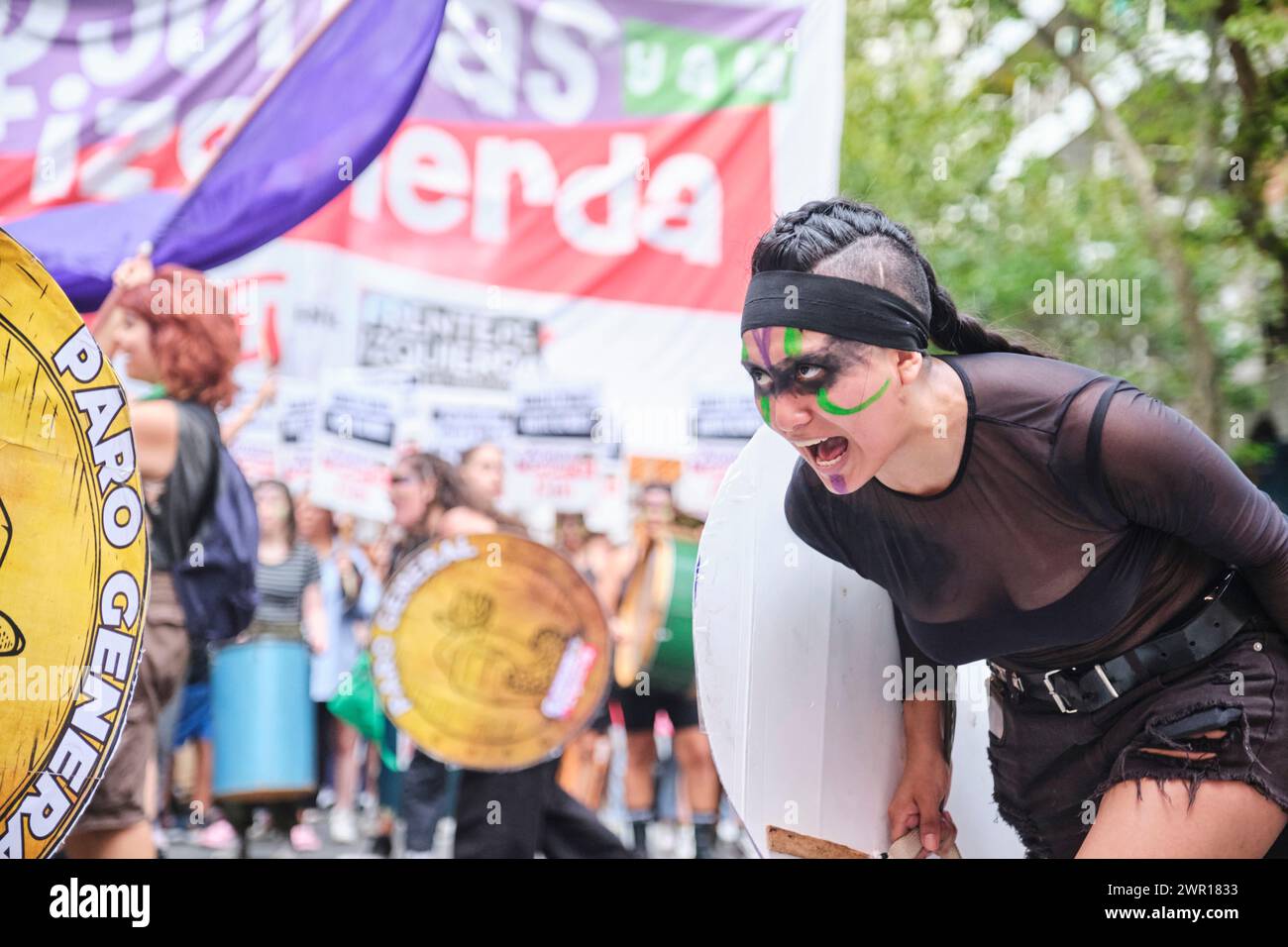 Buenos Aires, Argentina; March 8, 2024: Warrior cry of a young woman during the international women strike. Stock Photo