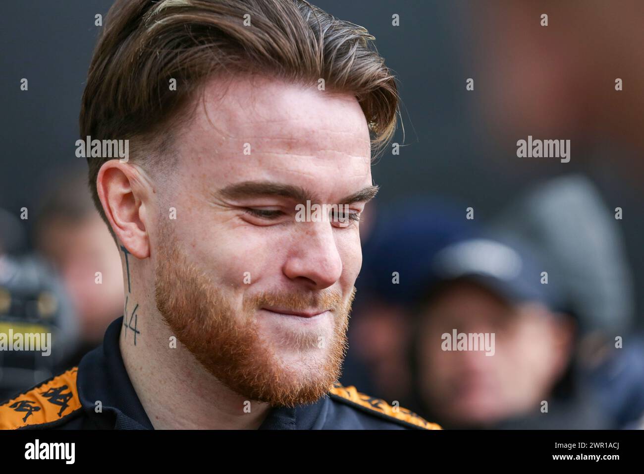 Hull City forward Aaron Connolly (44) portrait signs autographs during