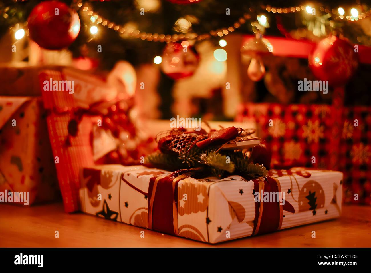 Beautiful Christmas gift boxes and presents under the Christmas tree ...
