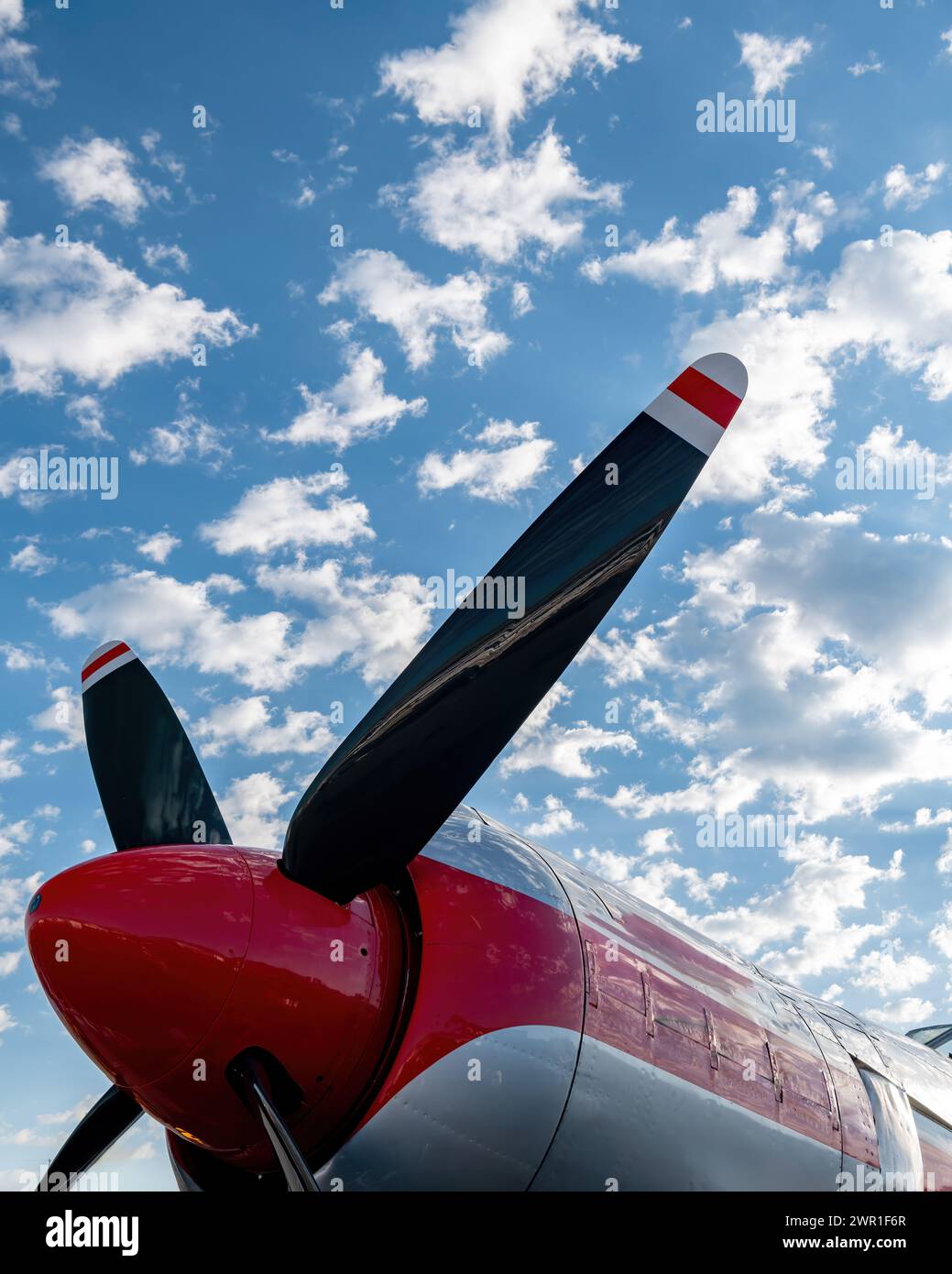 Props on an airplane against a cloudy sky Stock Photo - Alamy