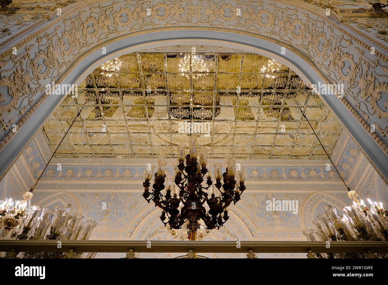 Tehran (Teheran), Iran, 06.24.2023: inside the Golestan Palace and low angle view of chandelier and mirror inside the palace of Golestan. Stock Photo