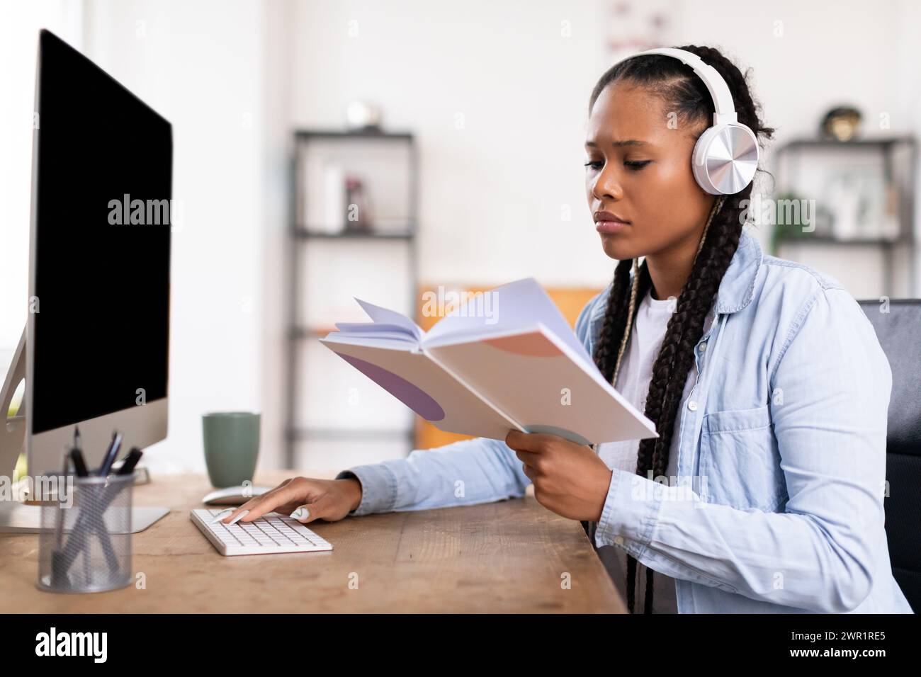 Reviewing Notes While Commuting Woman reviewing lesson notes hi-res stock photography and images - Alamy