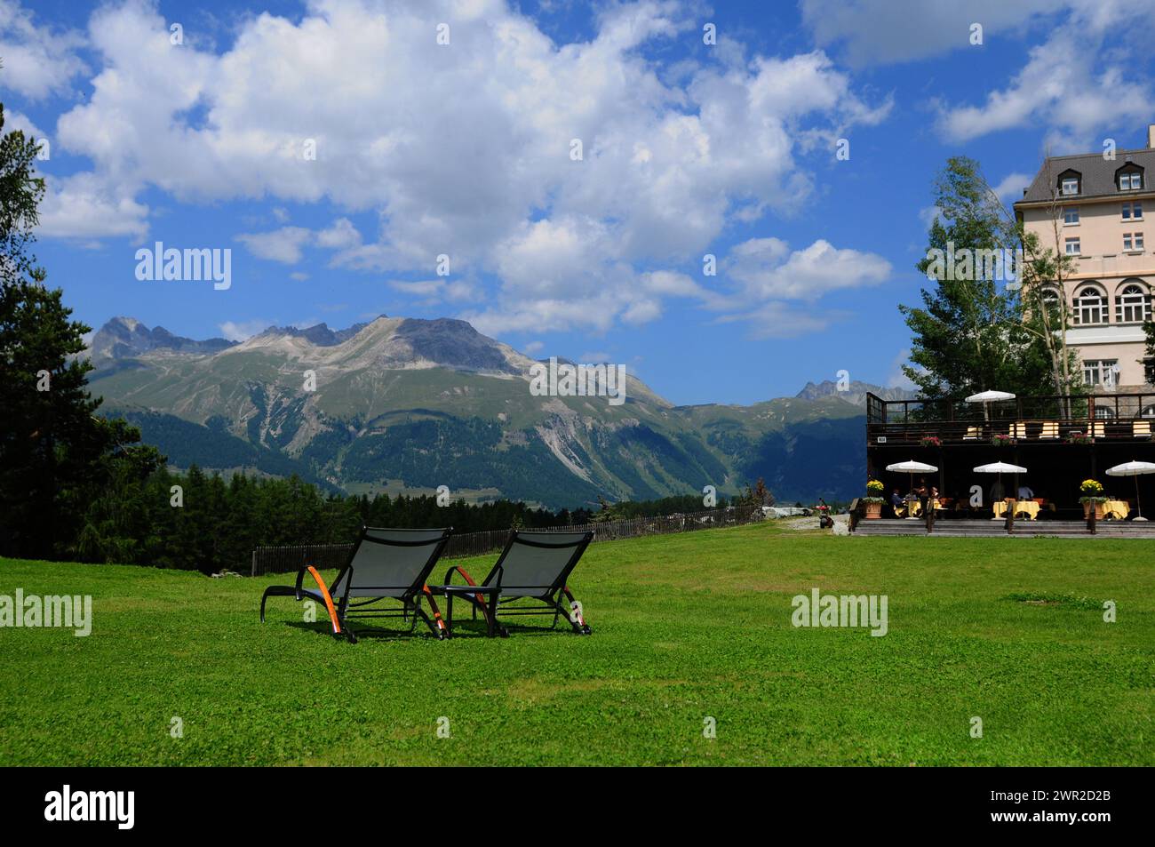 Relax and enjoy the mountain view at Kronenhof Grand Hotel in Pontresina |Entspannen, ausruhen und den herrlichen Blick in die Engadiner Berge geniess Stock Photo