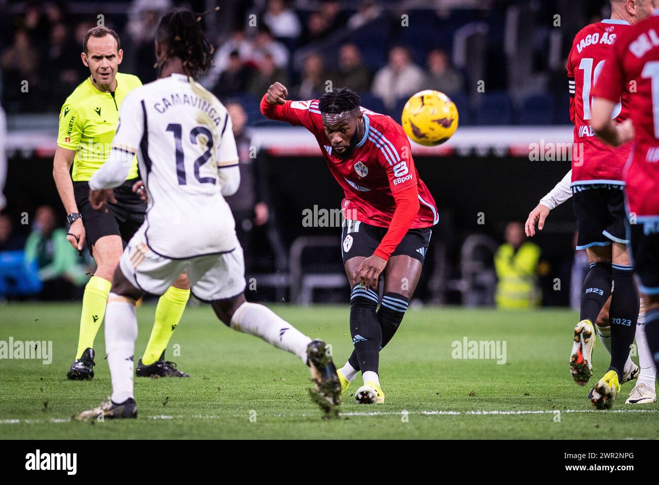 Madrid, Spain. 10th March 2024; Santiago Bernabeu Stadium, Madrid, Spain, Spanish La Liga Football, Real Madrid versus Celta Vigo; Bamba of Celta takes a shot past Camavinga of Real Credit: Action Plus Sports Images/Alamy Live News Stock Photo