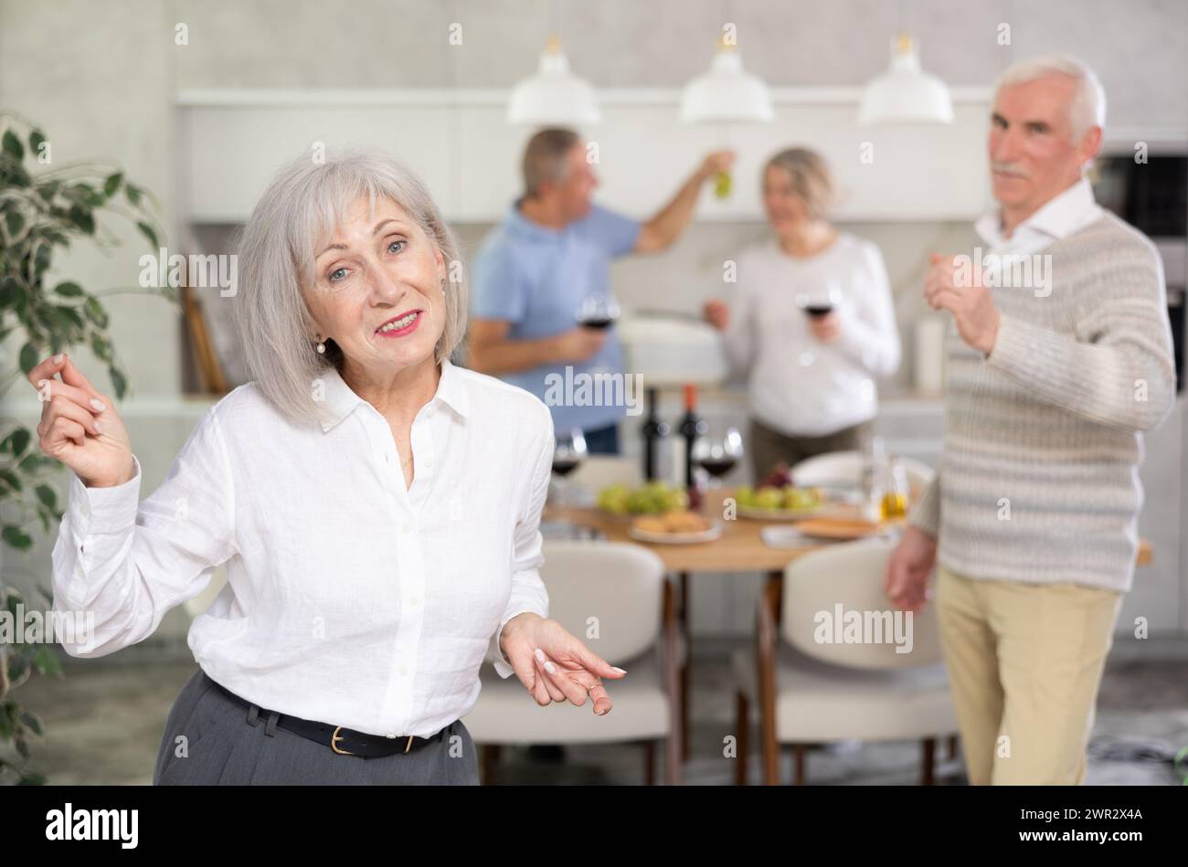 Mature woman dancing drink hi-res stock photography and images - Alamy