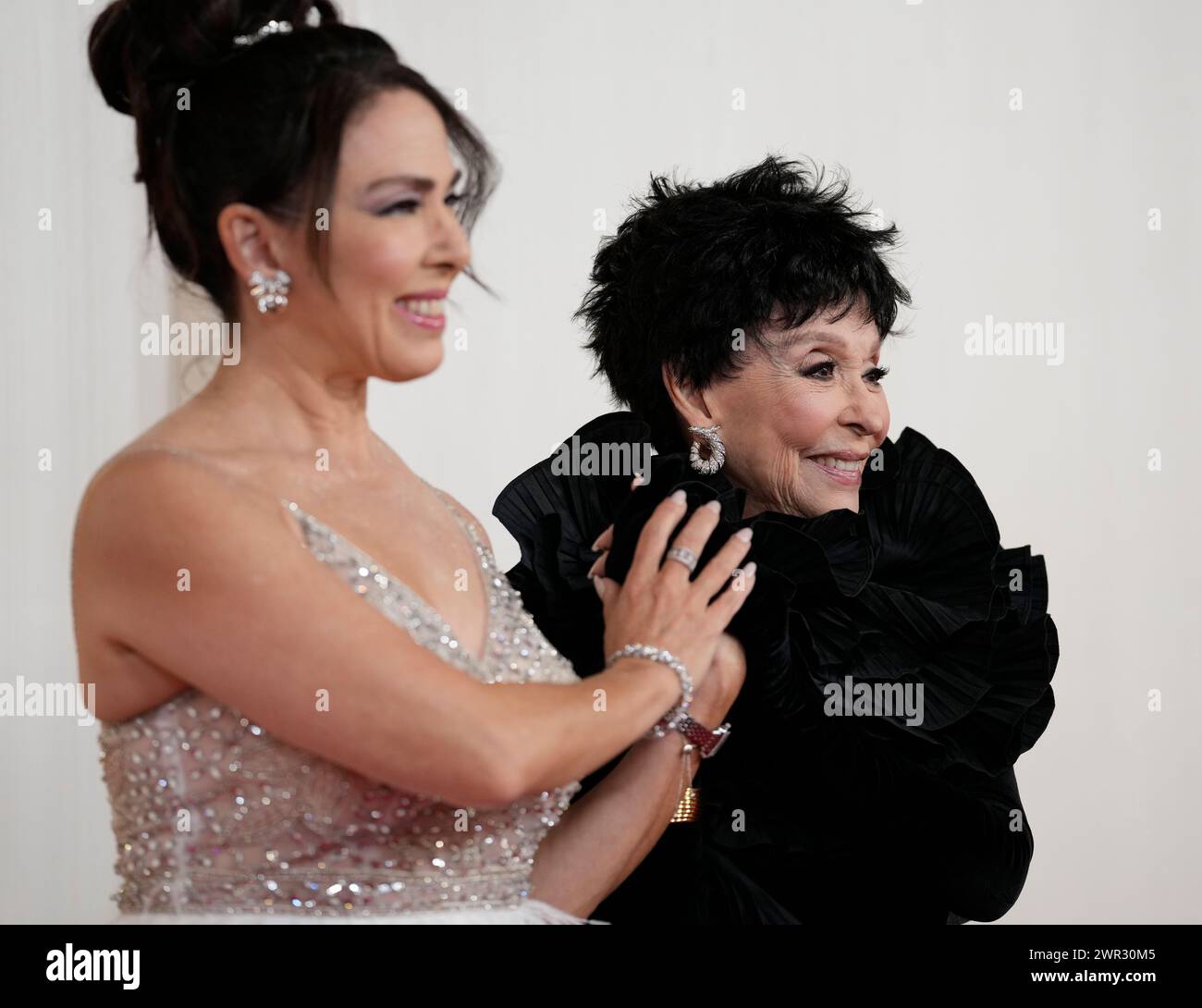 Fernanda Luisa Gordon, left, and Rita Moreno arrive at the Oscars on