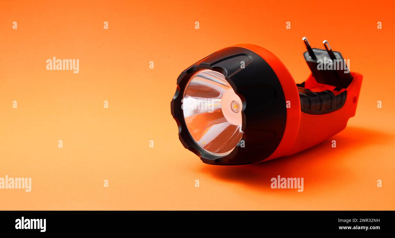 Led light flashlight that recharges with electricity Stock Photo