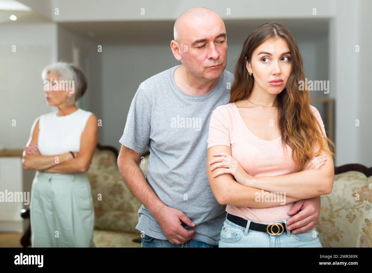 Unhappy father consoling sad daughter Stock Photo - Alamy