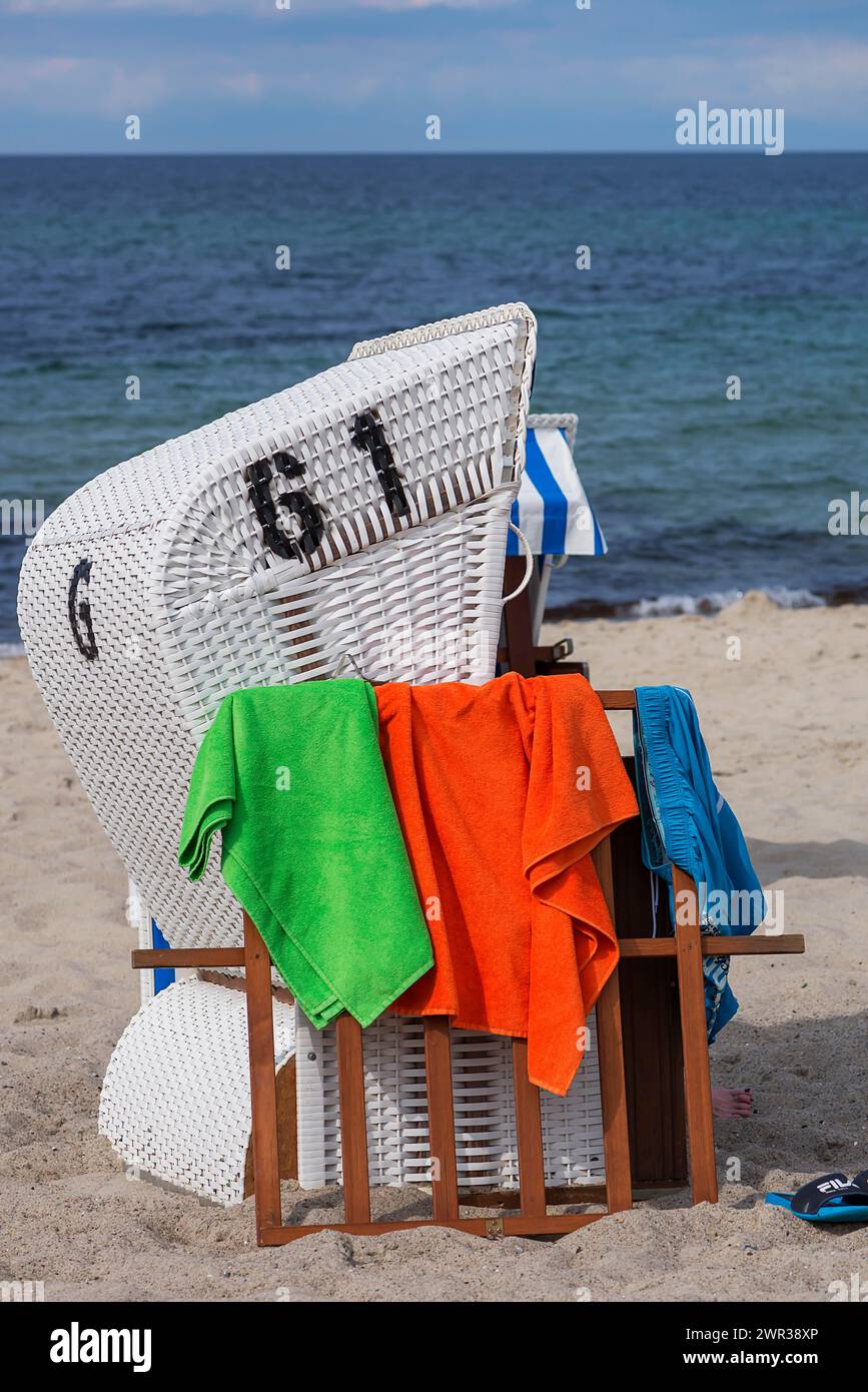 White beach chair with towels on the beach, Kuehlungsborn, Mecklenburg-Vorpommern, Germany Stock Photo