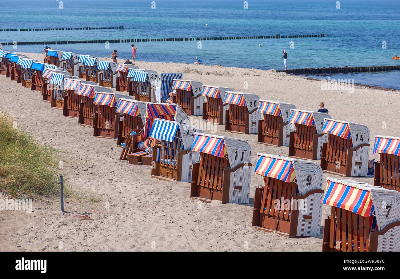 Colourful, lockable beach chairs on the Baltic Sea, Kuehlungsborn, Mecklenburg-Vorpommern, Germany Stock Photo