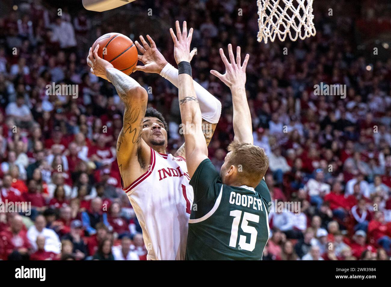 Indiana Center Kelel Ware 1 Shoots While Defended By Michigan State Center Carson Cooper 15 During The Second Half Of An Ncaa College Basketball Game Sunday March 10 2024 In Bloomington Ind Ap Photodoug Mcschooler 2WR3984 