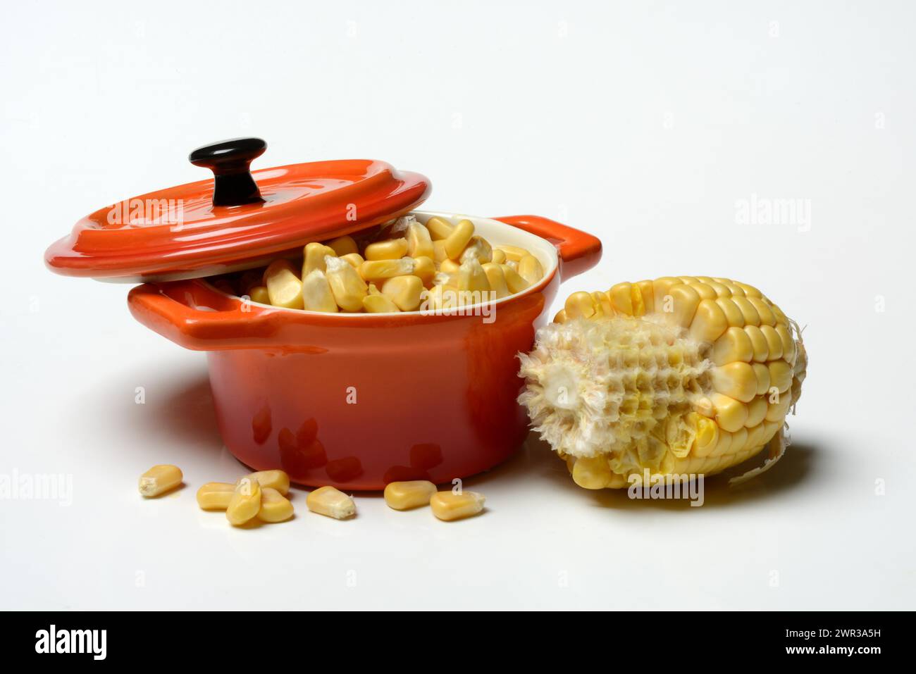 Fresh maize kernels in pots and cobs, corn (Zea mays) Stock Photo