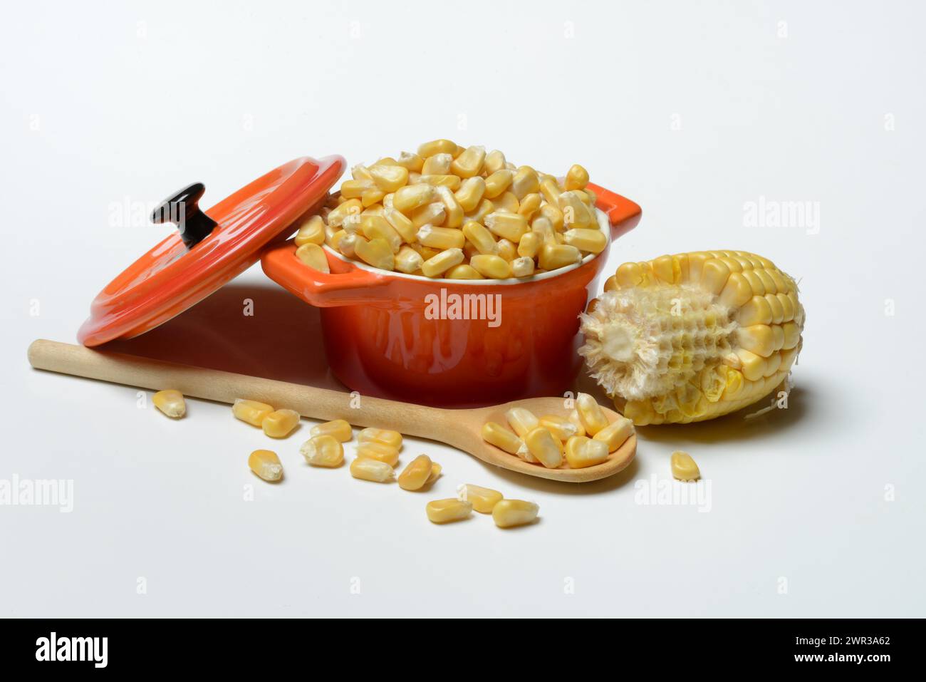 Fresh maize kernels in pots and cobs, corn (Zea mays) Stock Photo