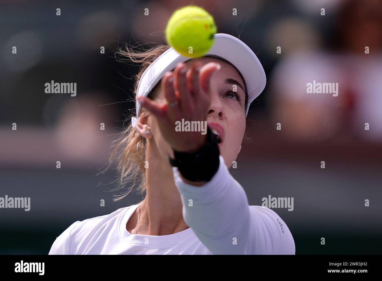 Anna Kalinskaya, of Russia, serves against Jasmine Paolini, of Italy