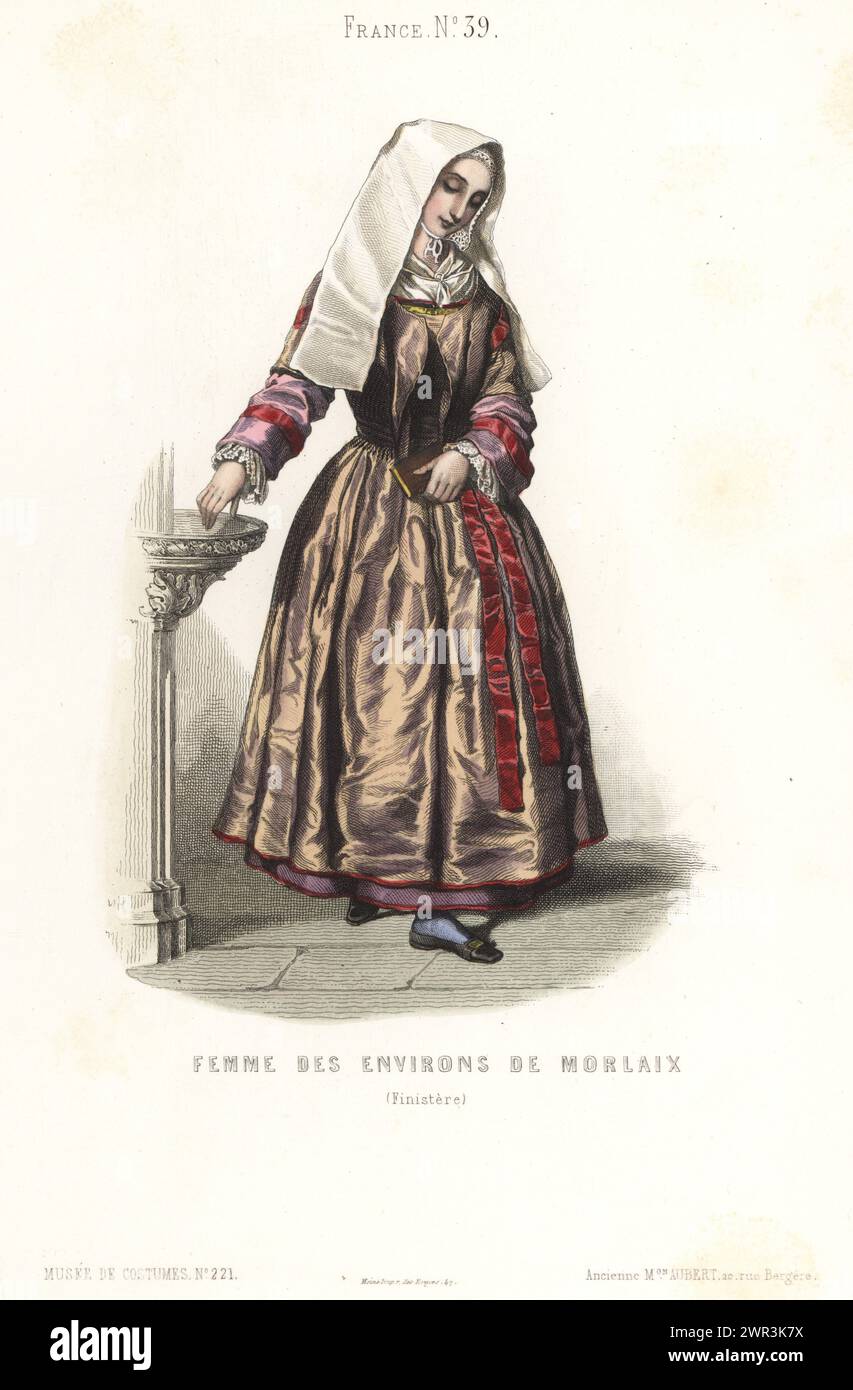 Breton woman of the region of Morlaix, France. In her Sunday best, of coiffe headdress with long tails, bodice and skirts in rich fabric, decorated with ribbons, dipping her fingers in the benitier of holy water in church. Femme des environs de Morlaix, Finistere. Taken from La Galerie royale des costumes, 1846. Handcoloured steel engraving after an illustration by Celestin Deshayes from Musée Cosmopolite, Musée de Costumes, Cosmopolitan Museum, published by ancienne maison Aubert, Paris, 1850. Stock Photo