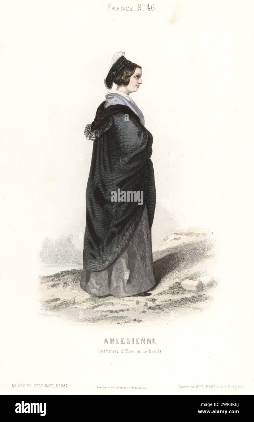 Woman of Arles, Provence, France, in winter or mourning costume. In black Ruban or ribbon coiffe, long hooded mantle over a dark grey gown. Arlesienne (costume d'hiver et de deuil). Handcoloured steel engraving by Armand Joseph Lallemand  from Musée Cosmopolite, Musée de Costumes, Cosmopolitan Museum, published by ancienne maison Aubert, Paris, 1850. Stock Photo
