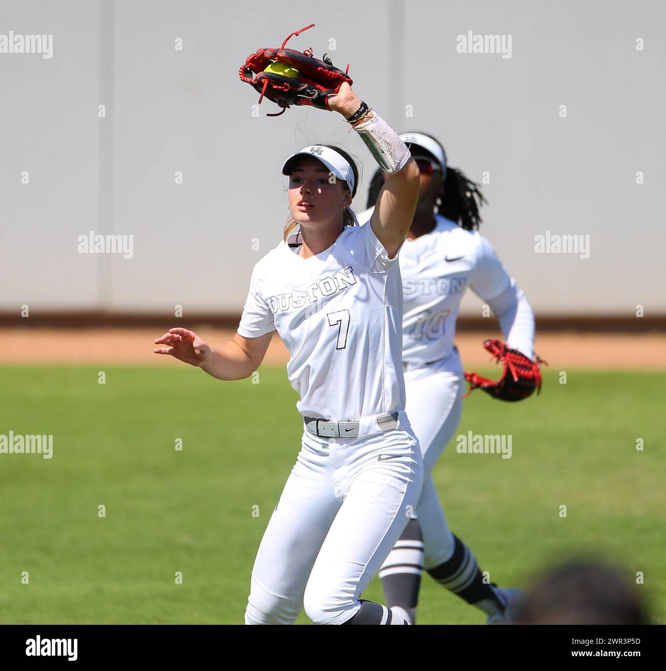 March 10, 2024: Houston infielder Mandy Esman (7) catches a fly ball for an out during an NCAA softball game between the Houston Cougars and the Texas Longhorns on March 10, 2024. Texas won, 8-6, and took the series two games to one. (Credit Image: © Scott Coleman/ZUMA Press Wire) EDITORIAL USAGE ONLY! Not for Commercial USAGE! Stock Photo