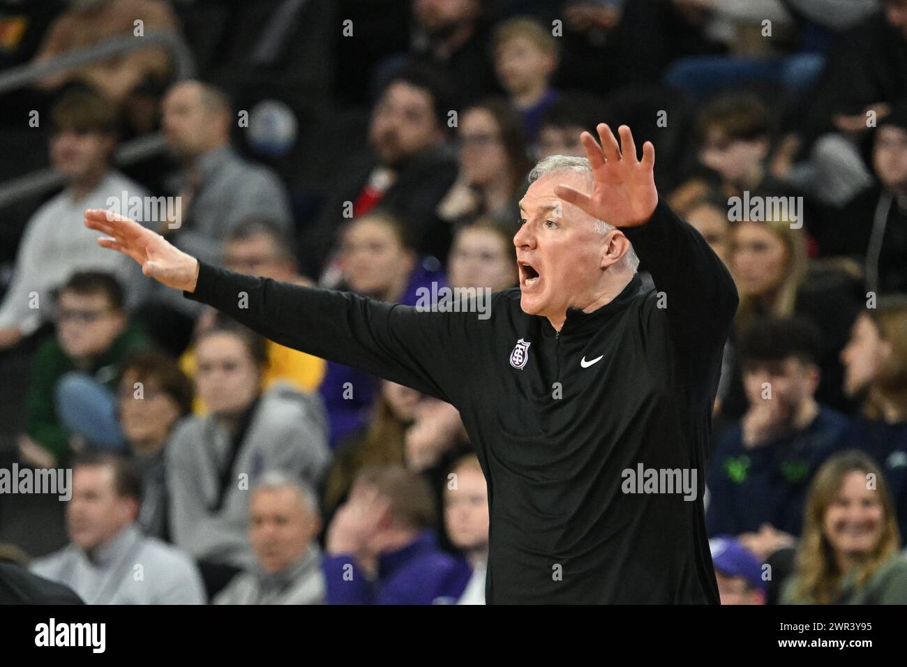 St. Thomas - Minnesota Tommies head coach John Tauer calls out plays to his team during an NCAA men's basketball quarter-final between the North Dakota State Bison and the University of St. Thomas Tommies at the Summit League Championships at the Denny Sanford PREMIERE Center in Sioux Falls, SD on Sunday, March 10, 2024. St. Thomas won 68-58.Russell Hons/CSM Stock Photo