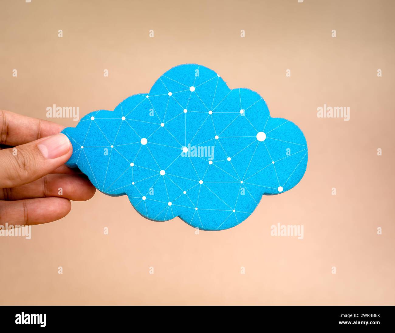 Cloud computing connection, network security technology concept. Blue cloud, holding by businessman hand isolated on white background, minimal style. Stock Photo