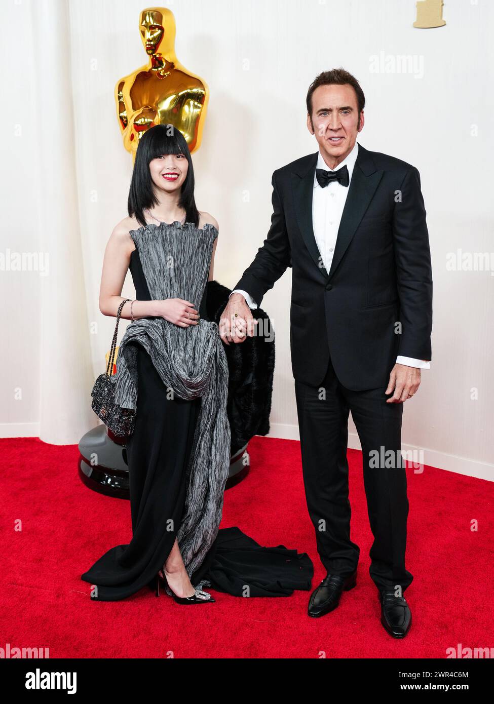 Los Angeles, USA. 10th Mar, 2024. Riko Shibata and Nicolas Cage walking